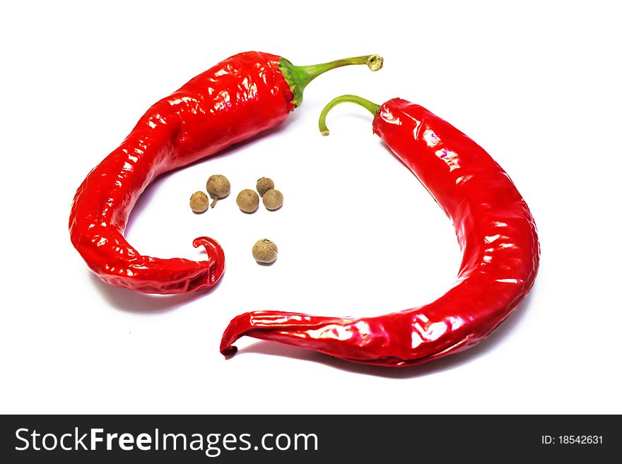 Red hot chili peppers on white background