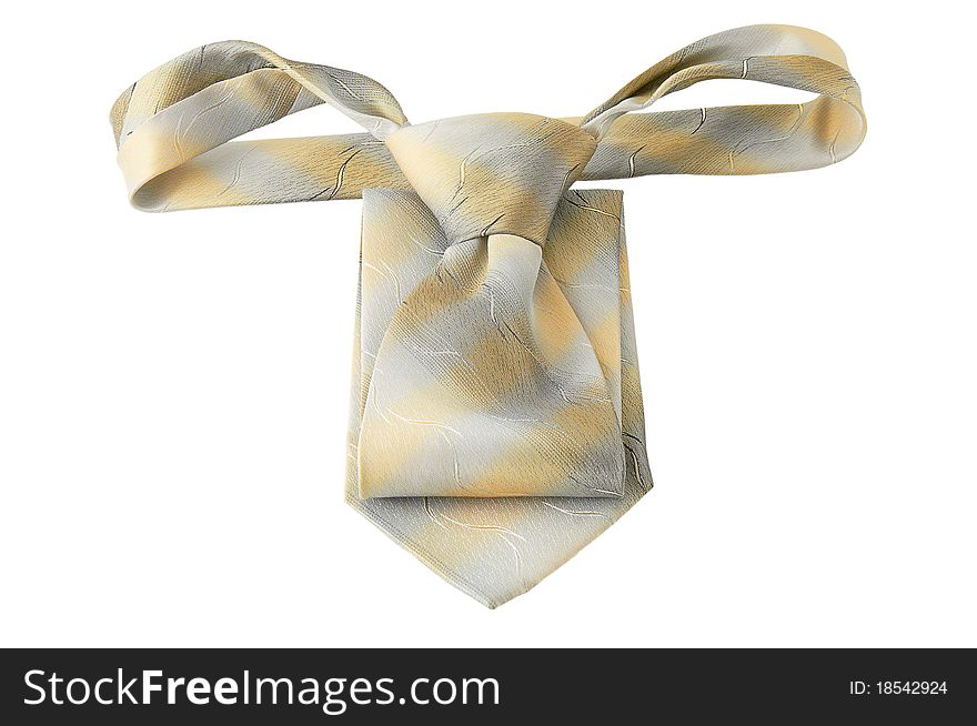 Tie beige tones isolated on a white background. Tie beige tones isolated on a white background