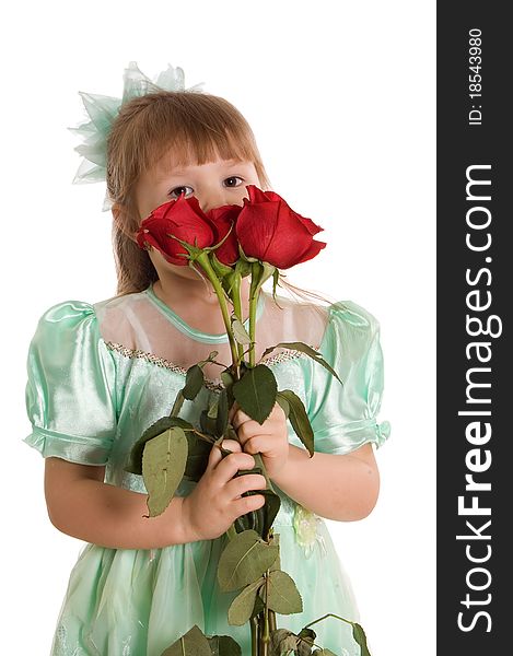 The little girl with a bouquet of roses on white