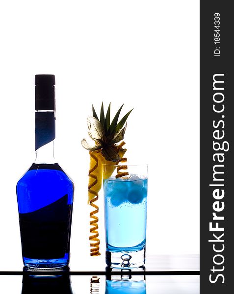 Blue lagoon cocktail isolated over white background