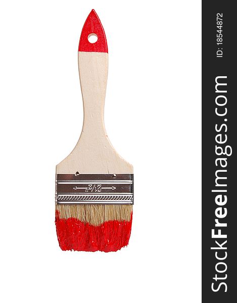 Studio photography of a brush and red paint in white back. Studio photography of a brush and red paint in white back