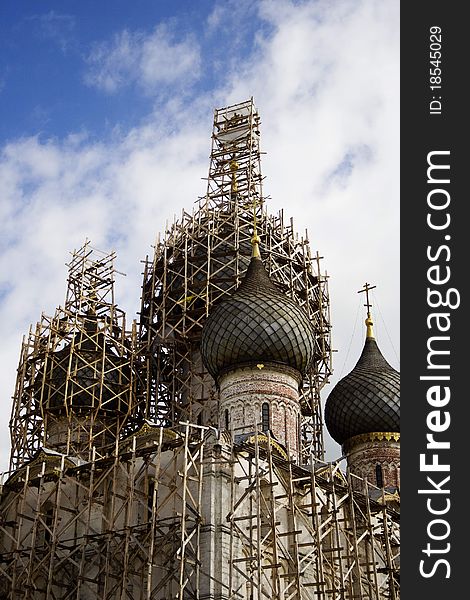 Orthodox church under reconstruction in summer