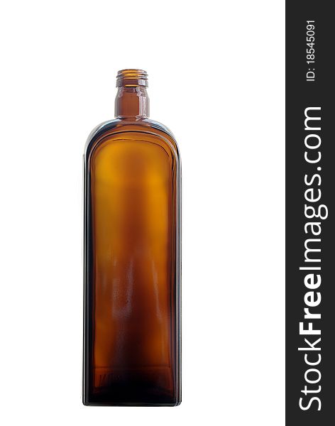 Transparent brown glass bottle on white background