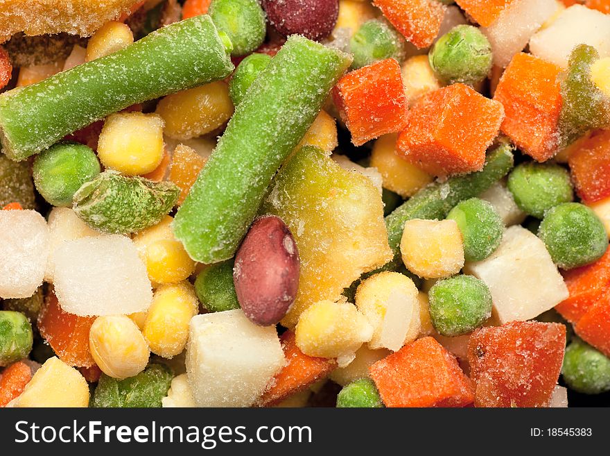 Background with colorful frozen vegetables