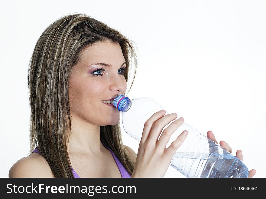 Beautiful blond woman drinking water. Beautiful blond woman drinking water