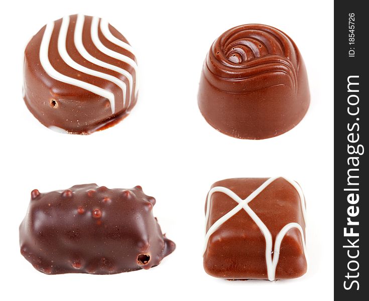 Collage of four chocolate candies isolated on white background. image was compiled from images. Collage of four chocolate candies isolated on white background. image was compiled from images