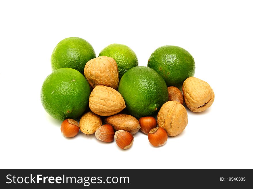 Green laime with nuts isolated on white