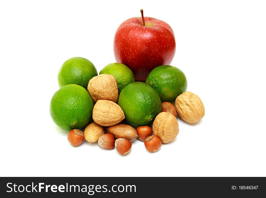Green laime with nuts, apple isolated on white