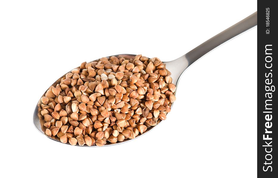 Raw buckwheat isolated on a white background. Raw buckwheat isolated on a white background