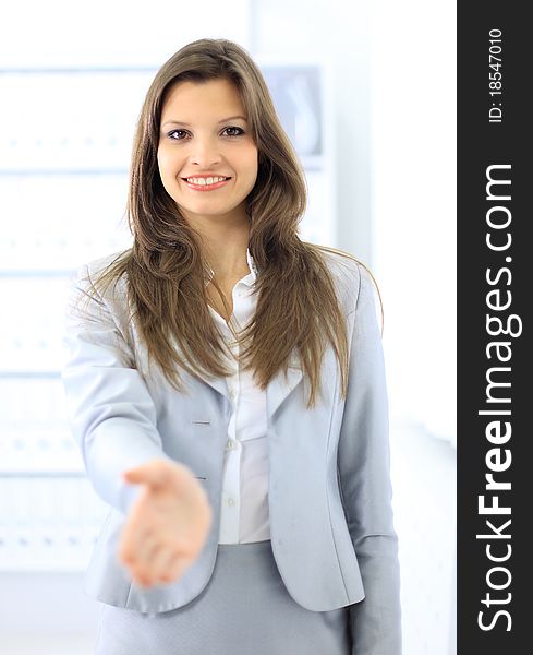 Woman with an open hand ready for handshake