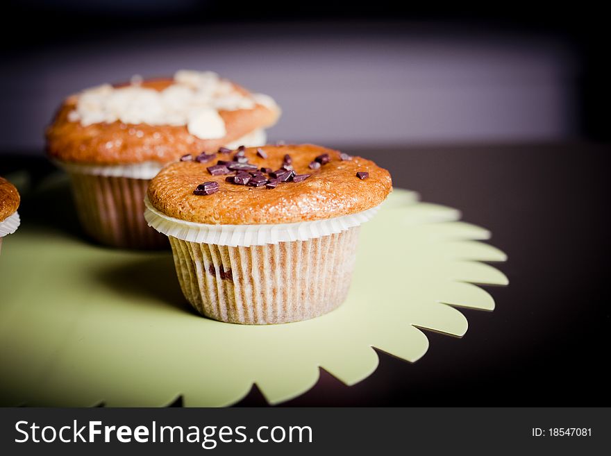 Fresh chocolate chip muffins . Macro with shallow dof.