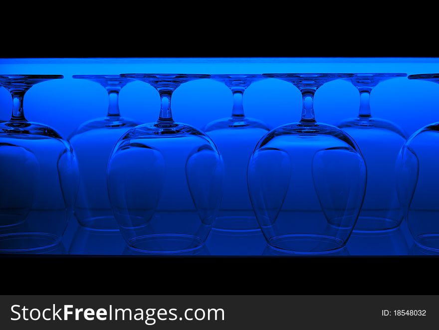 Glasses in the line lighted with background light