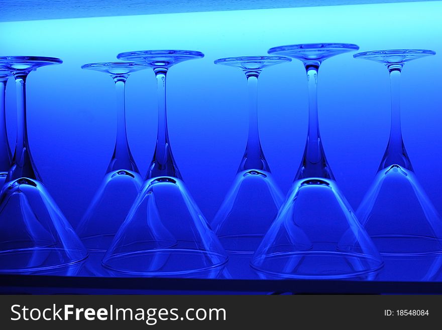 Glasses in the line lighted with background light