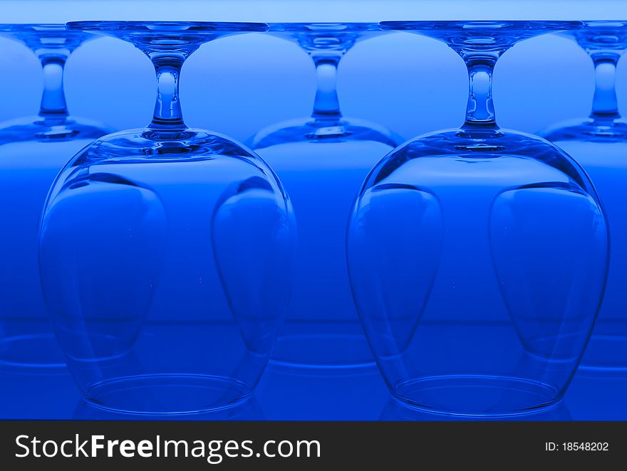 Glasses in the line lighted with background light