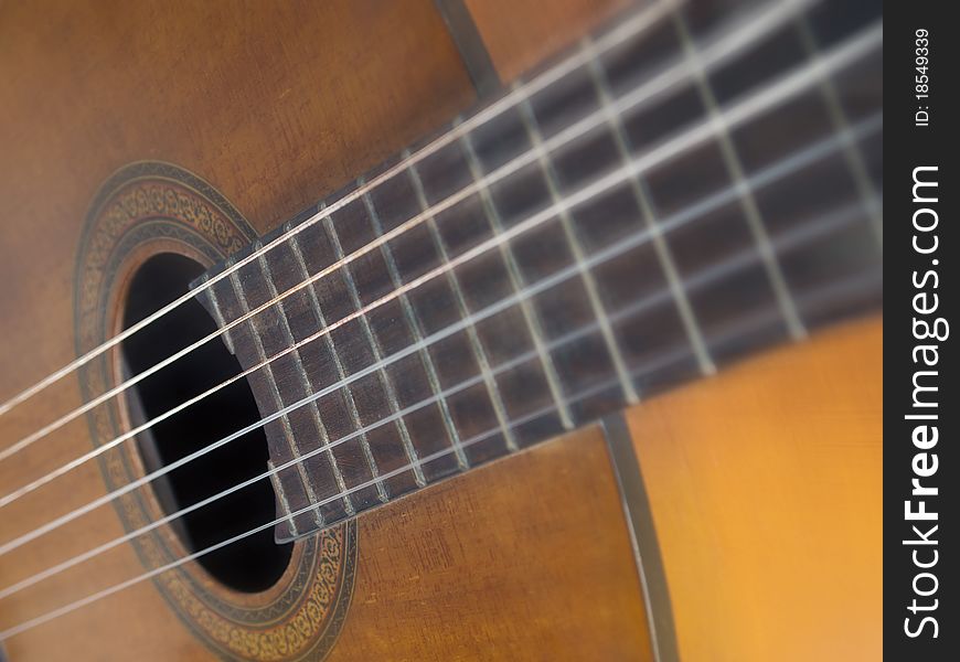 Top view of brown wood classic guitar