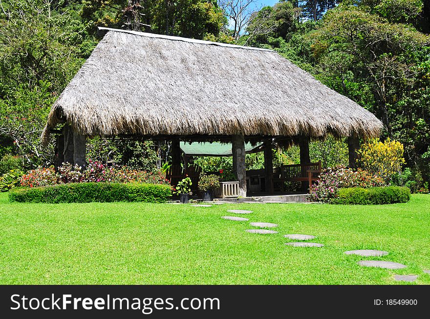 Rural tropical hut in the backyard of a house. Rural tropical hut in the backyard of a house