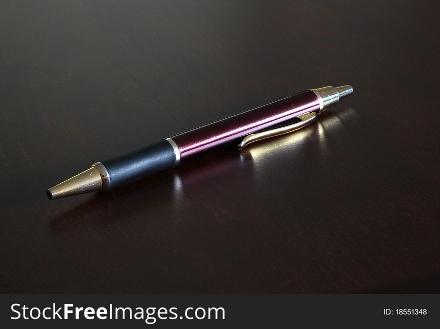 Nice pen on a wooden surface