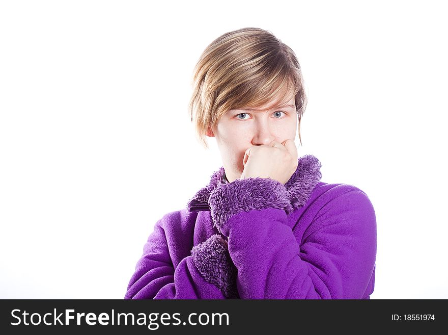 Young woman in a warm violet sweater, It is very surprised