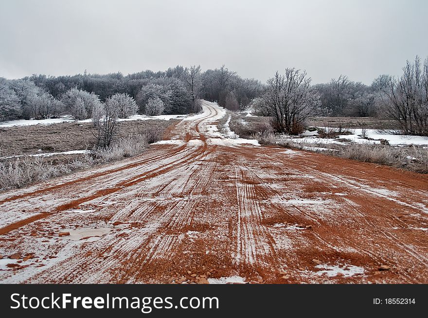 A dirt road in February at the lower plateau of the mountain Chater Dag in Crimea
