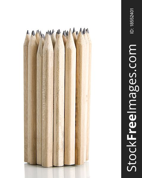 Pencils tower on white background