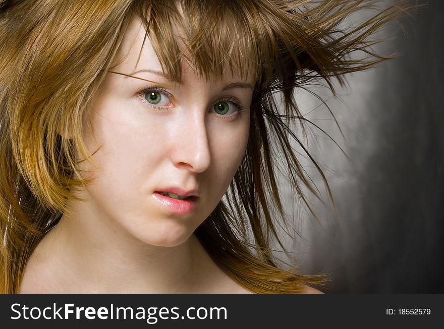 The potrait of a women with flying hair