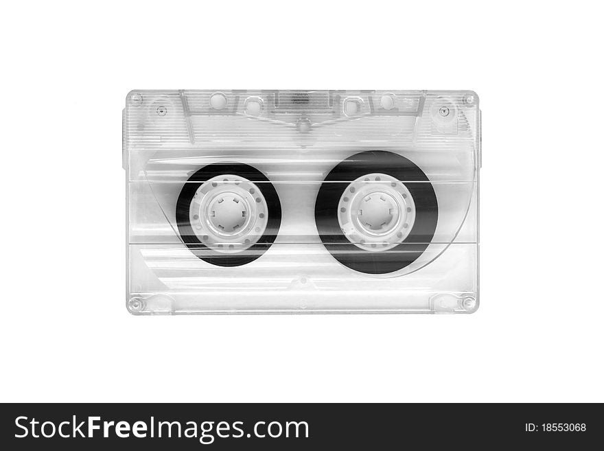 Old transparent tape cassette on white background