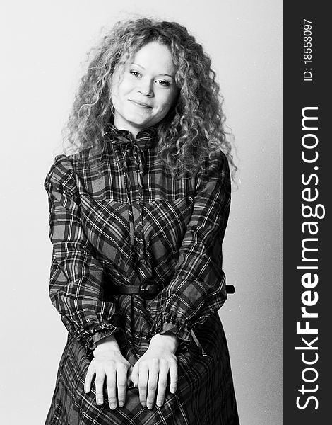 Desaturated portrait of beauty woman with blonde curly hairs. Desaturated portrait of beauty woman with blonde curly hairs