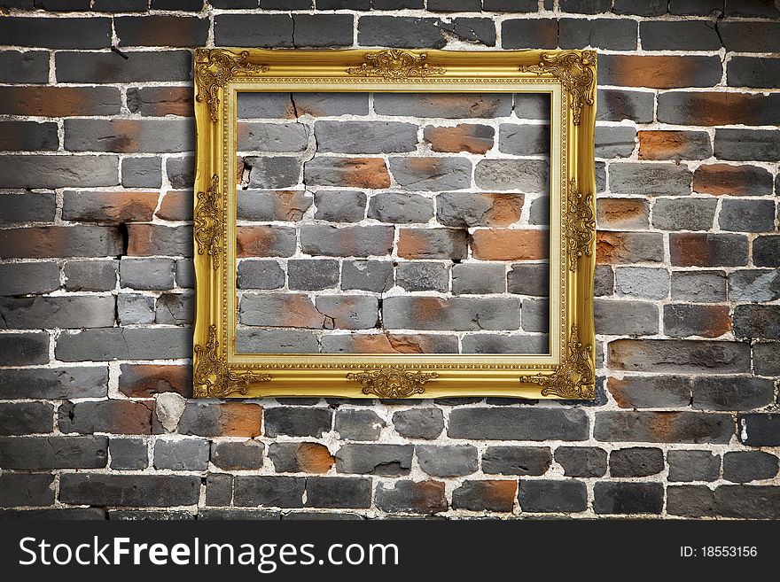 Golden Frame on Old Brick Wall Background