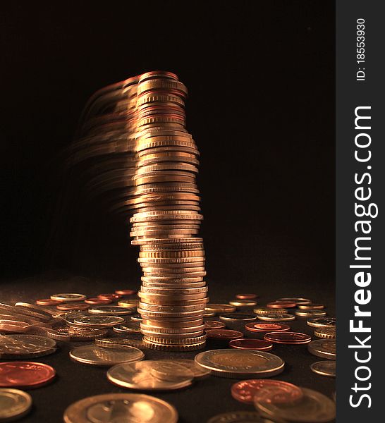 Afalling column of coins from different countries. Afalling column of coins from different countries