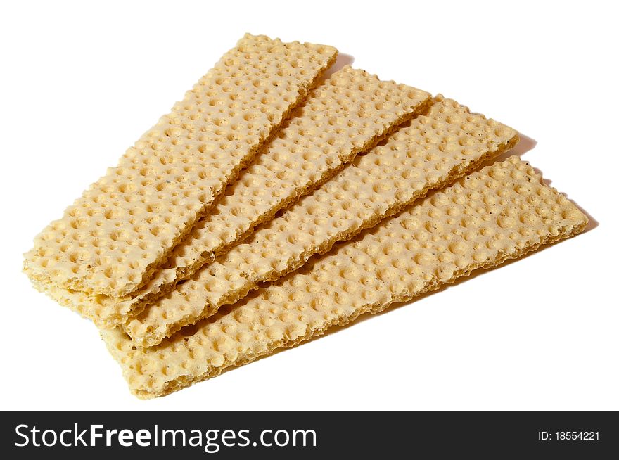 Nice isolated yellow crispbread on white background