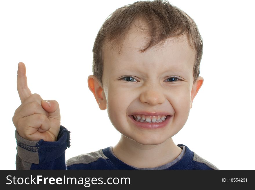 A little boy with blue eyes, threatening finger. Photos on a white background. A little boy with blue eyes, threatening finger. Photos on a white background.