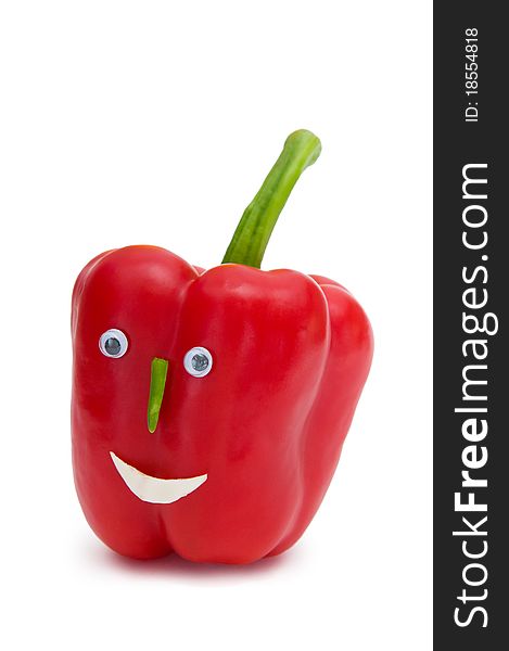 Sweet red pepper with a cheerful muzzle. Sweet red pepper with a cheerful muzzle