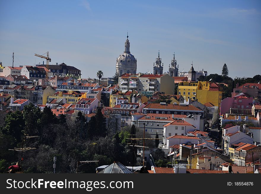 View City of Lisbon, rooftops, churches, bridges