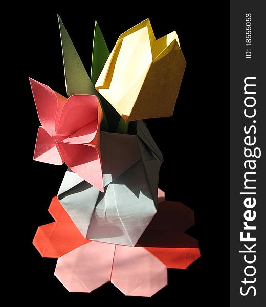 Origami tulip bouquet isolated on black