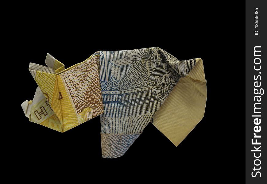 Origami Bank-note Pig Isolated On Black