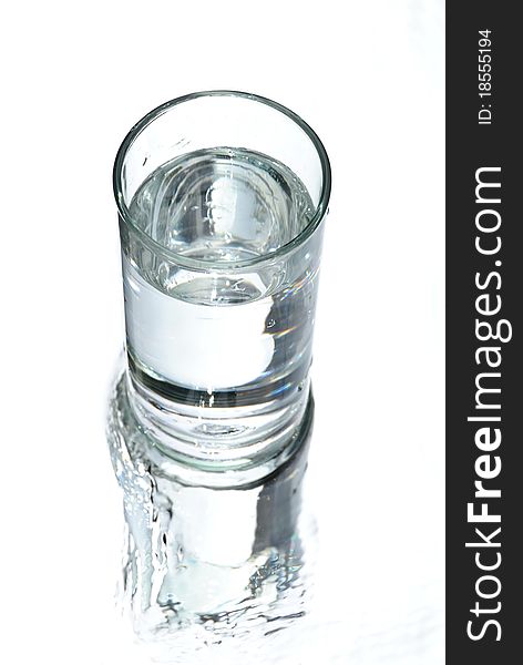 Water picture in a glass on back white ground. Water picture in a glass on back white ground