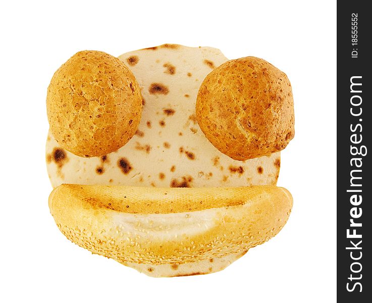 Cute smiling face made of pita and buns isolated on white with clipping path. Cute smiling face made of pita and buns isolated on white with clipping path