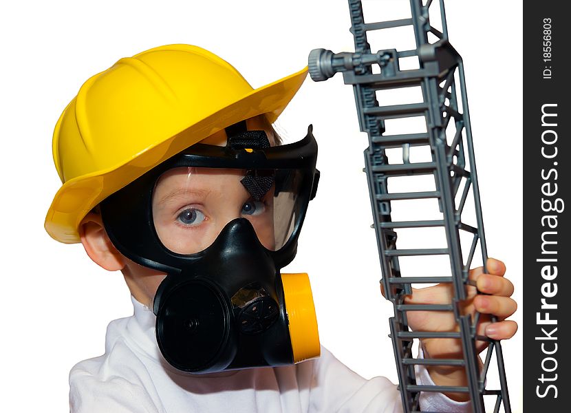 Little boy - preschooler in fireman face mask and helmet with isolated on white background