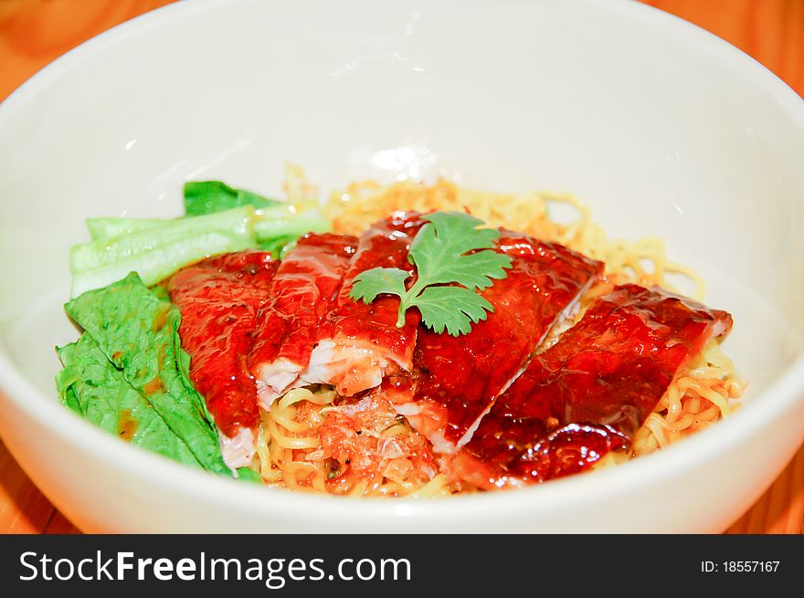 Duck noodle in white dish