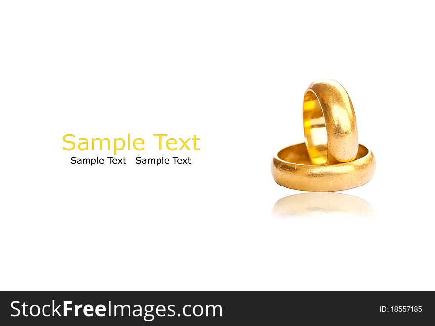 Two Gold Rings Isolate On The White.