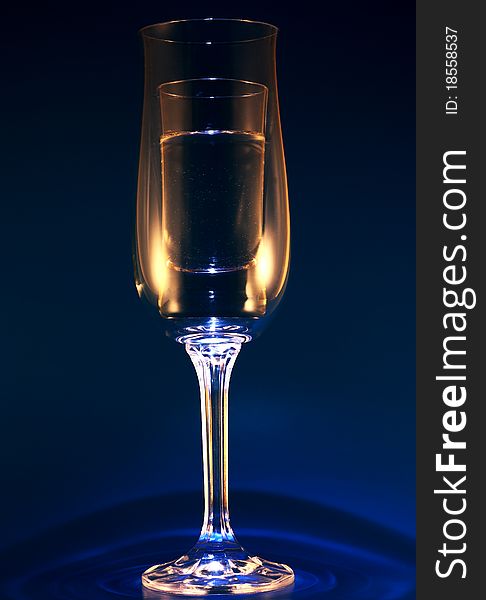 Glass of champagne with the glass inside