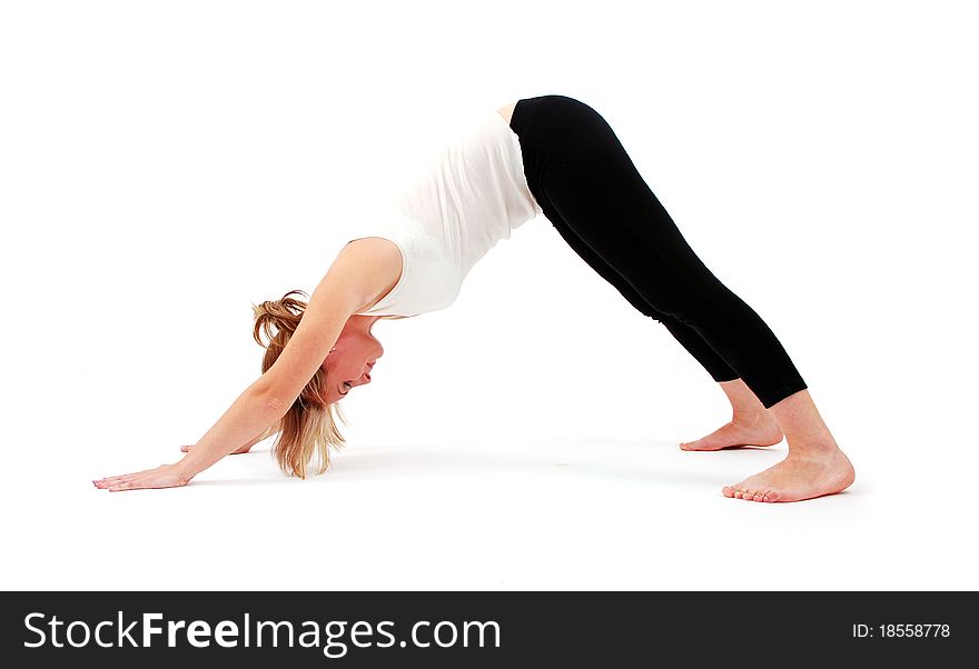 Beautiful girl practicing yoga on white background