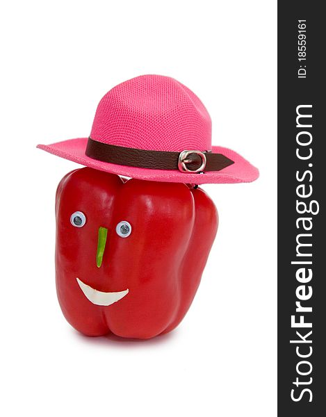 Amusing red sweet pepper in a hat. Amusing red sweet pepper in a hat