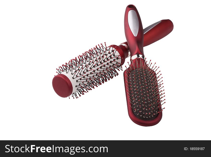 There are two red hairbrushes.