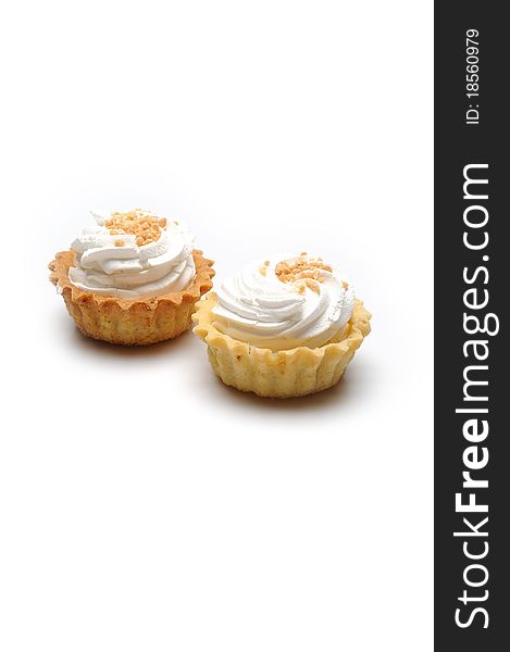 Fresh cream cupcake isolated on white