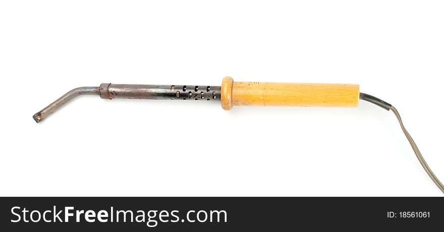 Soldering iron with a wooden handleron a white background.