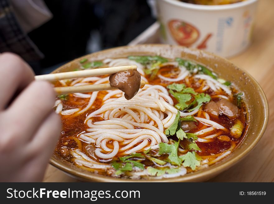 Weird but delicious chinese style cuisine -a serving of pig's intestines or tripe, with some shallot, garlic, ginger, caraway and other Chinese fixing. Braised and stewed in dark soya sauce and spices, served with porridge or white flat rice noodles. Savoury and tasty, commonly eaten as breakfast or lunch, with salted vegetables, hard boiled eggs, etc. Popular in China as well as with chinese in the Southeast Asia, especially in Sichuan province, where the food is one of the eight most famous food in China. Weird but delicious chinese style cuisine -a serving of pig's intestines or tripe, with some shallot, garlic, ginger, caraway and other Chinese fixing. Braised and stewed in dark soya sauce and spices, served with porridge or white flat rice noodles. Savoury and tasty, commonly eaten as breakfast or lunch, with salted vegetables, hard boiled eggs, etc. Popular in China as well as with chinese in the Southeast Asia, especially in Sichuan province, where the food is one of the eight most famous food in China.