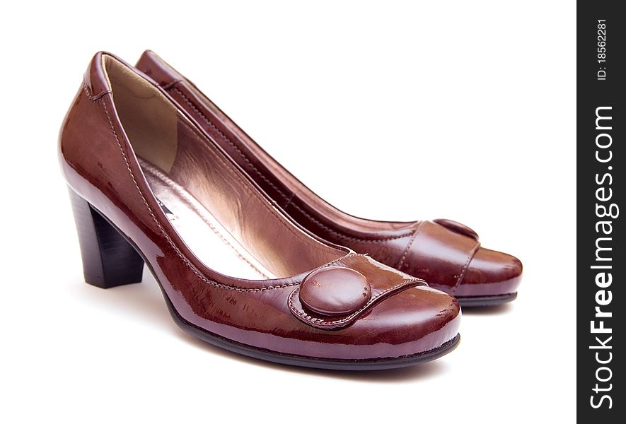 The Pair Of Brown Woman S Shoes