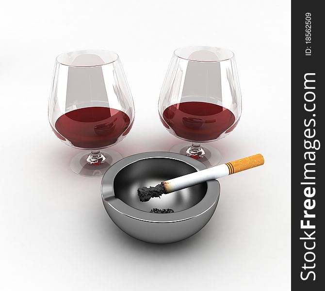 Ashtray with a cigarette and a glass of wine