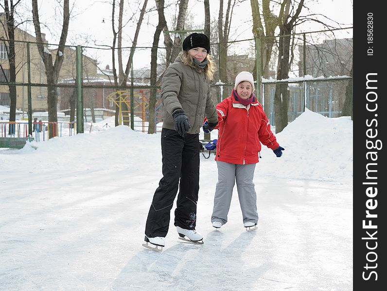 Women On Skating Rink